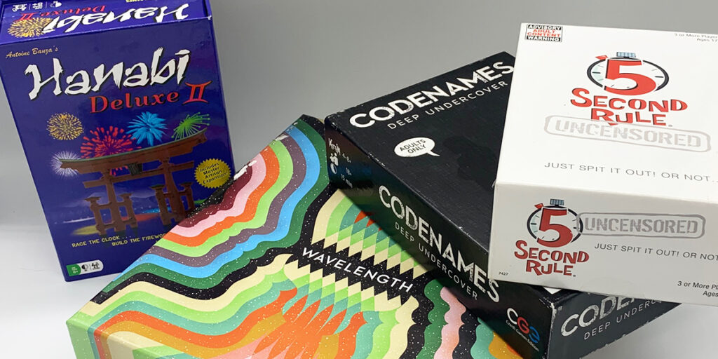 a group of board games like codenames including hanabi, wavelength, codenames deep undercover and 5 second rule