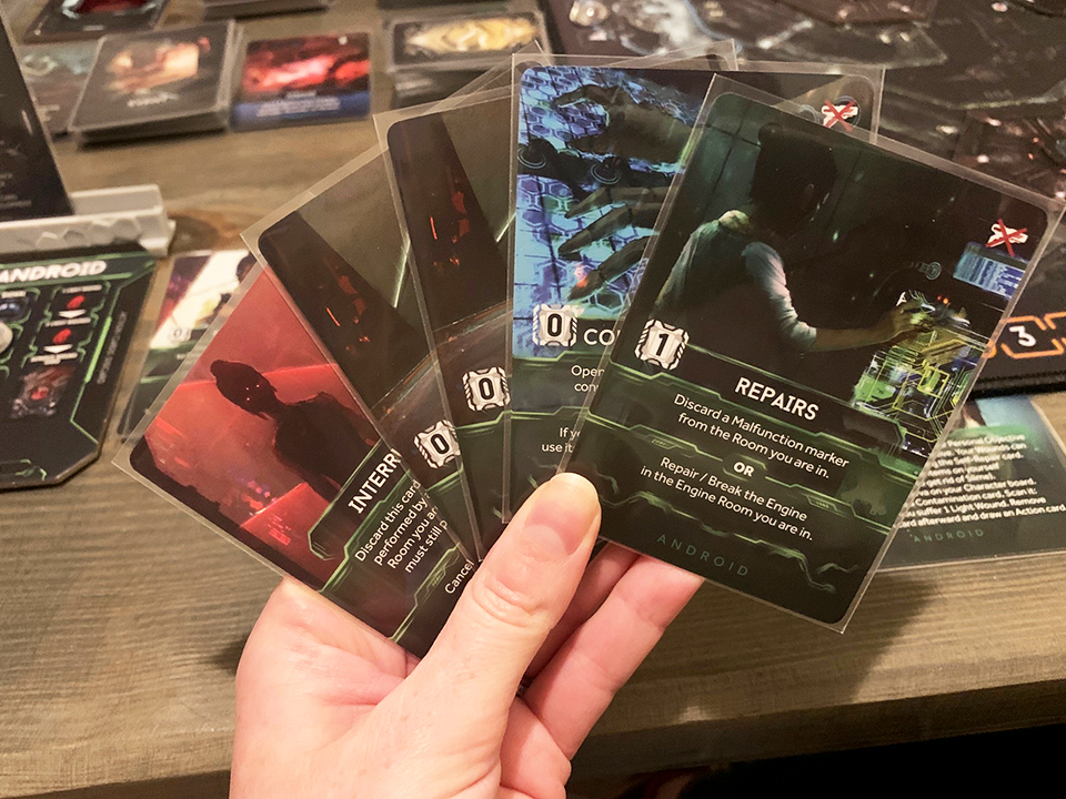 five action cards in hand for the android character in the game nemesis 