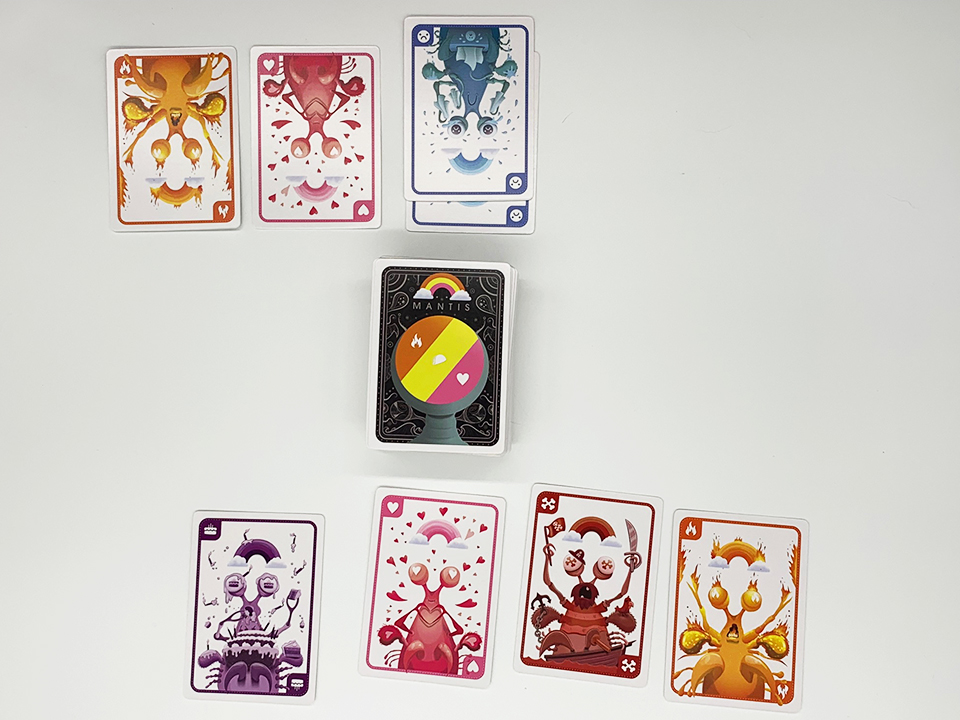 set up game of mantis with four cards and a deck in the middle